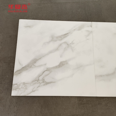 Wysokiej jakości biały marmurowy panel ścienny 600x9mm tabliczka laminowana WPC wodoodporna Łatwo czyszczyć