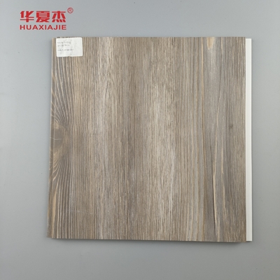 Fabryka Sprzedaż bezpośrednia Pvc Panel ścienny Laminated Wooden Grains Pvc Dekoracja Panel sufitowy mieszkaniowy / biurowy