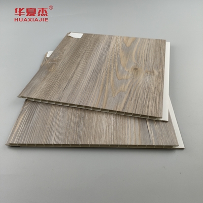 Fabryka Sprzedaż bezpośrednia Pvc Panel ścienny Laminated Wooden Grains Pvc Dekoracja Panel sufitowy mieszkaniowy / biurowy