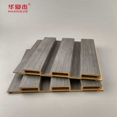 Nowy produkt Wpc Płytkowany Panel ścienny Laminated Wood Grain Wpc Panele Instaluj łatwo Dekoracja ścian wewnętrznych